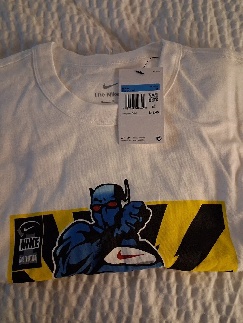 Nike White Short-Sleeve Tee with Blue Comic Graphic and Yellow Accent